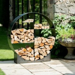 Circular Log Store 120cm with Logs on Patio - Lifestyle - Firepits UK - WEB 600x600 - Lo Res 16