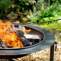 Saturn fire pit lit with Ash Rake - Lifestyle - Firepits UK - LoRes600x600 321