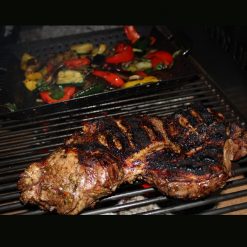 Asado BBQ with Log Store Close Up of Food Lifestyle - Firepits UK - BBQ - Lo Res