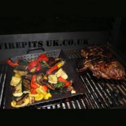 Asado BBQ with Log Store Lit Close up of Food Lifestyle - Firepits UK - BBQ - Lo Res
