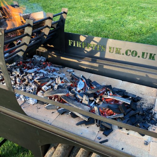 Asado BBQ with Log Store Lit Lifestyle Close Up of Fire Bricks - Firepits UK - BBQ - Lo Res
