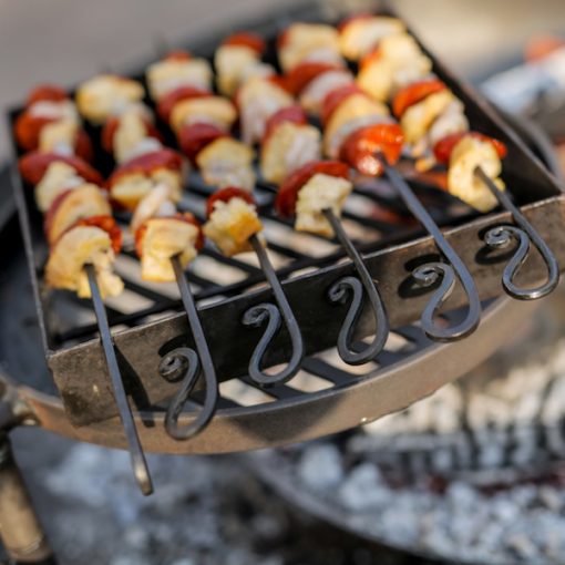 Kebab Rack for Fire Pit with Chorizo and Chicken on Swing Arm BBQ Rack Lifestyle - Firepits UK - WEb - Lo Res