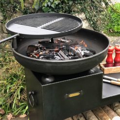 Tiered Fire Bowl 60 with Swing Arm BBQ Rack and Log Store Lit Fire Pit Lifestyle Close Up - Firepits UK - WEB - Lo Res