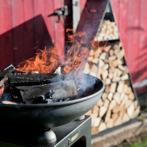 Fire Bowl with Log Store - Lifestyle lit close up with log store - Firepits UK - WEB - Lo Res