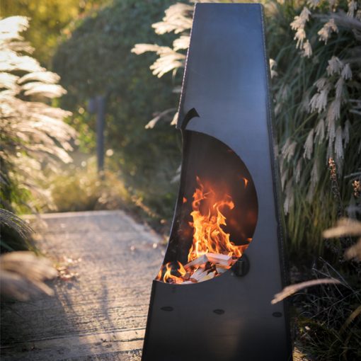 Big Apple Chiminea with Swing Arm BBQ Rack Fire Pit - Lifestyle lit in garden - Firepits UK - WEB - Lo Res