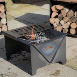 Flat Pack Fire Pit - Lifestyle with grill and log store seat - WEB 600x600 - Lo res