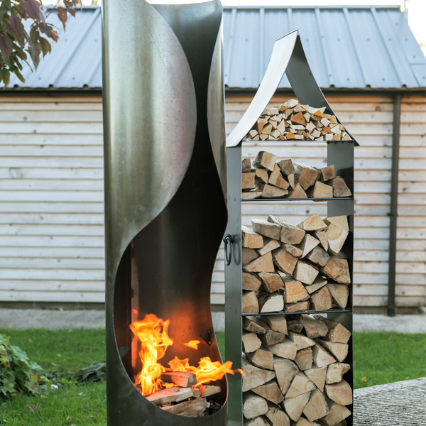 Curve Chiminea with Swing Arm BBQ Rack - Lifestyle with Pagoda Log Store - Firepits UK - WEB - Lo Res
