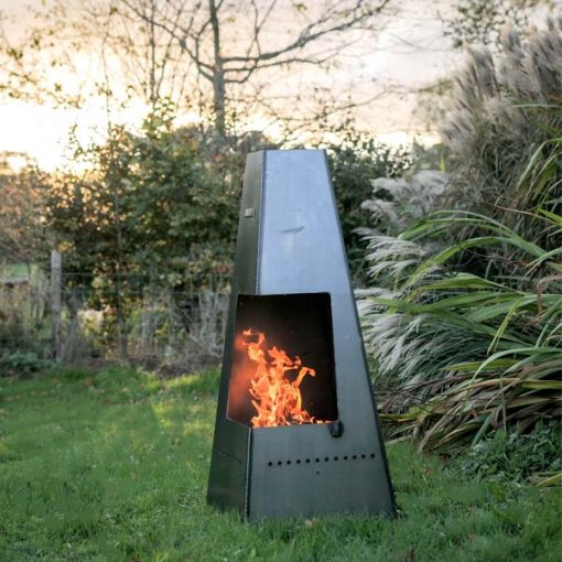 Piazza Chiminea with Swing Arm BBQ Rack - Lifestyle lit - Firepits UK - WEB - Lo Res