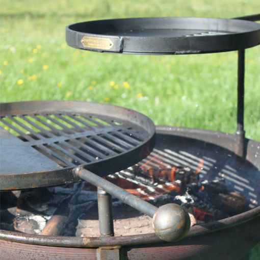Warming Swing Arm BBQ Rack - Lifestyle over fire1 - Firepits UK - WEB 600x600 - Lo Res