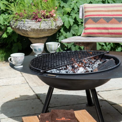 Calypso Fire Pit - Lifestyle with BBQ Rack and mugs - Firepits UK - WEB 600x600 - Lo Res