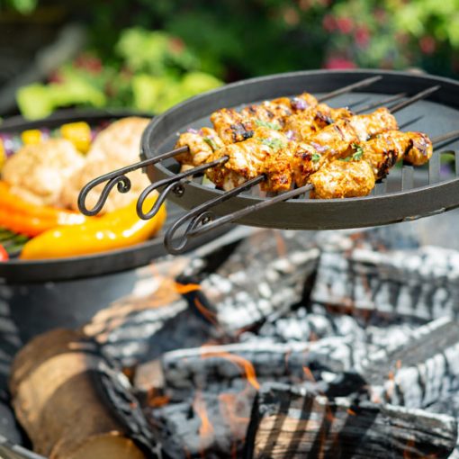 Warming Swing Arm with Chicken Skewers on Plain Jane Fire Pit with Swing Arm BBQ Rack - Lifestyle - Firepits UK - 600x600 266