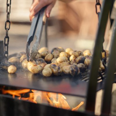 Asado Primera BBQ - Lifestyle close up with potatoes - Firepits UK - WEB 600x600 - Lo Res