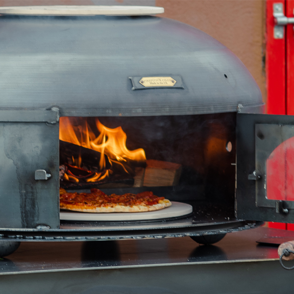 Dome Oven - Lifestyle close up with door open with pizza - Firepits UK - WEB 600x600 - Lo Res