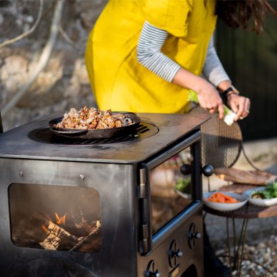 Small Outdoor Wood Burner BBQ - Lifestyle food prep - Firepits UK - WEB 600x600 - Lo Res