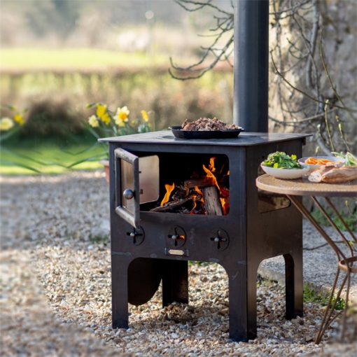 Medium Outdoor Wood Burner BBQ - Lifestyle lit 1 - Firepits UK - WEB 600x600 - Lo Res