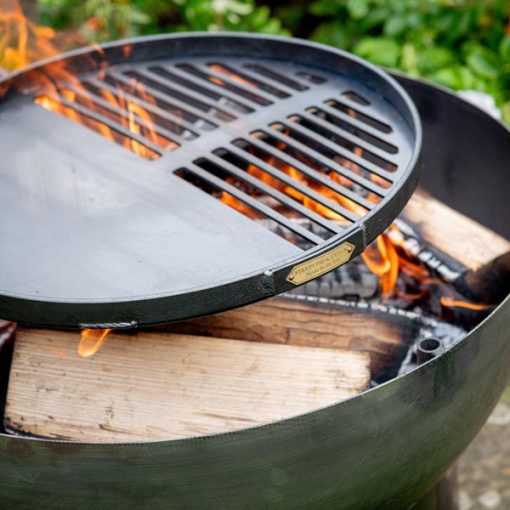 Solex fire pit lit with Swing Arm BBQ Rack close up - Lifestyle - Firepits UK - LoRes600x600 407