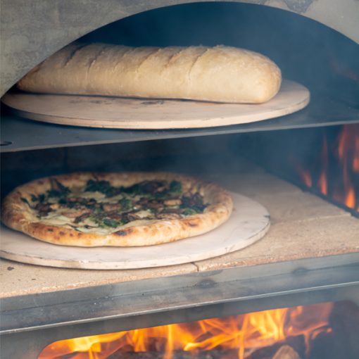 Tall Pizza Oven Lit - Fire Cage open with Pizza Close Up - Lifestyle - Firepits UK - LoRes663600x600